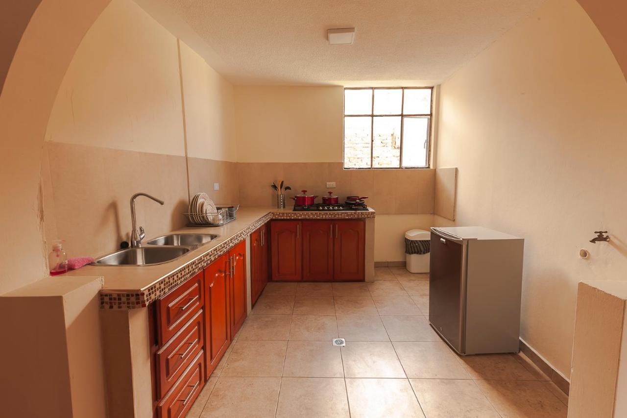 Los Ponchos Inn Apartasuite Otavalo Dış mekan fotoğraf