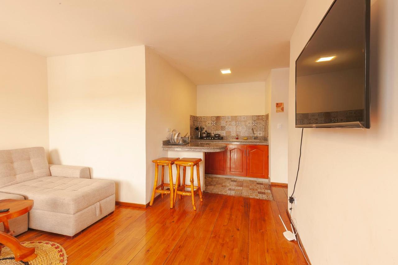 Los Ponchos Inn Apartasuite Otavalo Dış mekan fotoğraf
