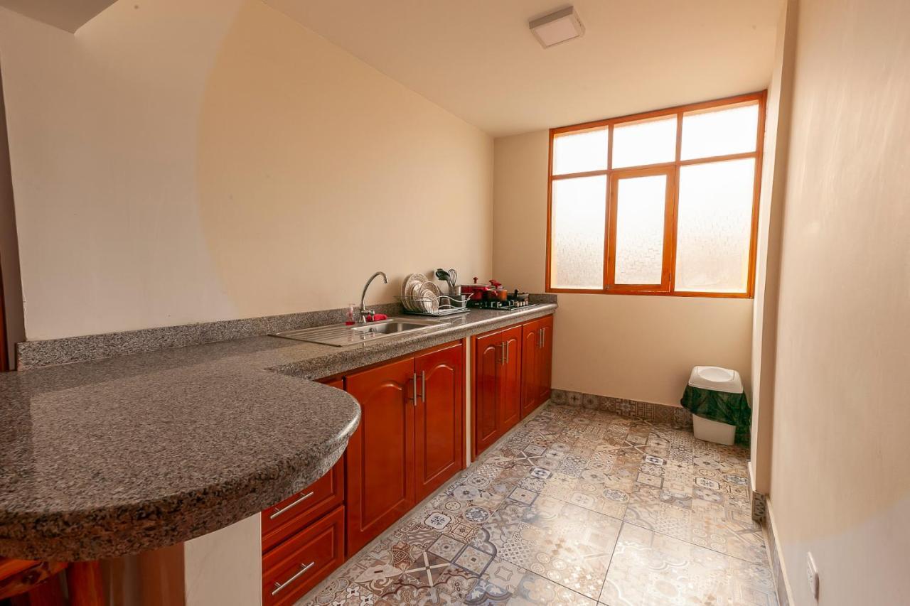 Los Ponchos Inn Apartasuite Otavalo Dış mekan fotoğraf