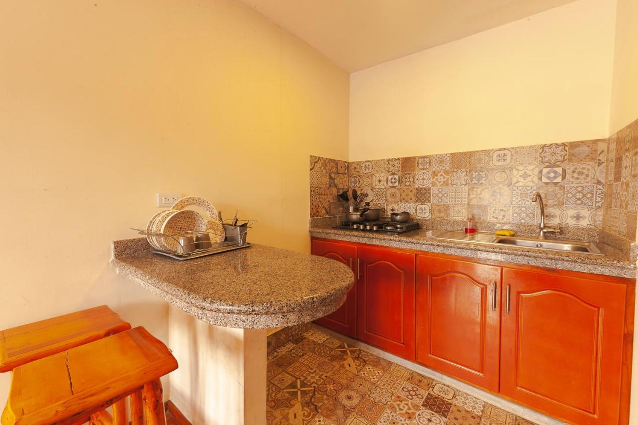 Los Ponchos Inn Apartasuite Otavalo Dış mekan fotoğraf