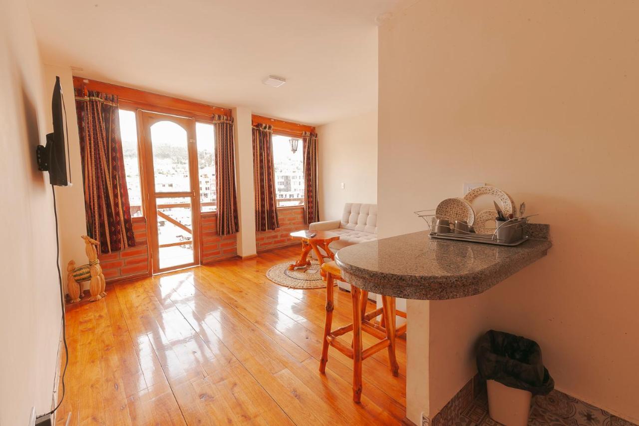 Los Ponchos Inn Apartasuite Otavalo Dış mekan fotoğraf